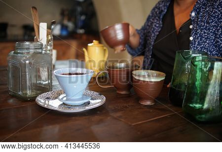Barista Preparing Brewing Coffee With Coffee Maker And Drip Kettle.