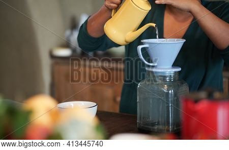 Barista Preparing Brewing Coffee With Coffee Maker And Drip Kettle.