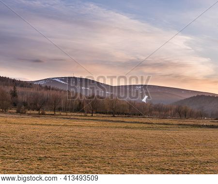 A Distant Hill Located In The Suedet Mountains In The Vicinity Of The City Of Swieradow Zdroj. The S