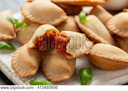 Margarita Margherita Pizza Parcels Pockets Filled With Tomato, Mozzarella Cheese And Basil Served On