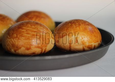 Glazing Gone Wrong While Baking Brioche Buns, A French Yeast Bread Enriched With Milk, Butter And Eg