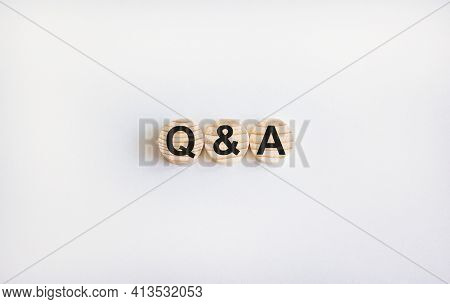 Q And A Questions And Answers Symbol. Concept Words 'q And A' On Wooden Circles On A Beautiful White