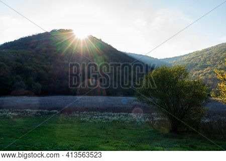 Scenic Sunset In Summer Forest With Sun Rays In Caucasus Mountains By Anapa, Sukhoy Liman