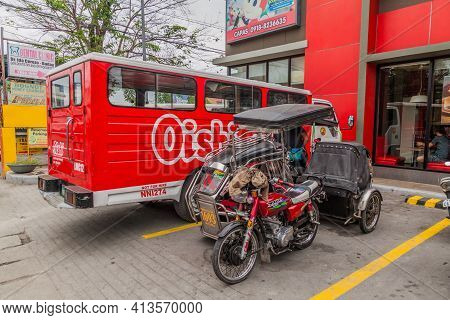 Capas, Philippines - Jan 29, 2018: Tricycles At A Parking Lot In Capas Tow