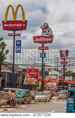 Bacolod, Philippines - February 6, 2018: Signs Of Various Fast Food Restaurants In Bacolod, Philippi