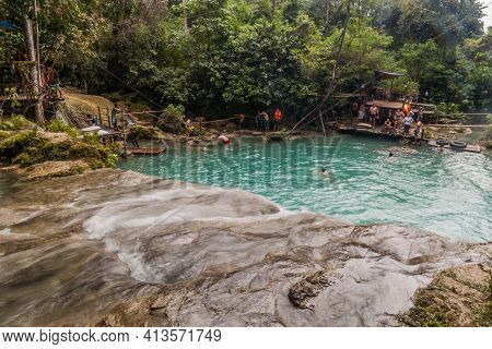 Siquijor, Philippines - February 9, 2018: People Enjoy Cambugahay Falls On Siquijor Island, Philippi