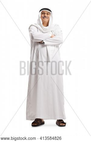 Full length portrait of a cheerful mature arab man in a traditional dishdasha isolated on white background