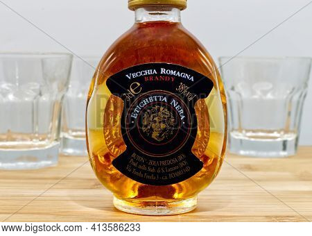 Bologna - Italy - March 3, 2021: A Bottle Of Italian Vecchia Romagna Brandy Etichetta Nera On Wooden