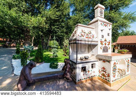 Traditional Russian Monument To The Russian Stove As Garden Decoration.