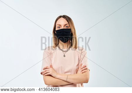 Woman Portrait With Protective Mask On Face On White Background