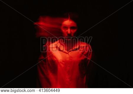 Blurry Portrait Of A Psychopathic Girl With Schizophrenic Mental Disorders
