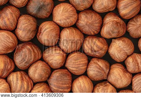 Hazelnuts Heap As A Background. Top View. Flat Lay. Hazel Nuts Pattern