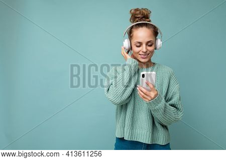 Photo Shot Of Beautiful Joyful Smiling Young Female Person Wearing Stylish Casual Outfit Isolated Ov