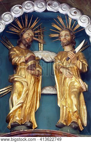 SVETI PETAR MREZNICKI, CROATIA - JULY 14, 2013: St. Cosmas and Damian, statue on the high altar in the parish church of St. Peter in Sveti Petar Mreznicki, Croatia