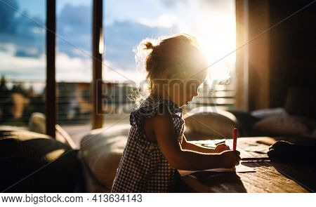 Small Girl Drawing Pictures In Wooden Cabin, Holiday In Nature Concept.