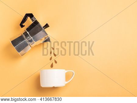 Paper Cut Drops Pouring From A Geyser Coffee Maker Into A Cup On Yellow Paper Background. Coffee Pre
