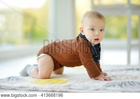Cute Five Months Old Baby Boy Rocking Back And Forth On Hands And Knees. Baby During Floortime. Ador