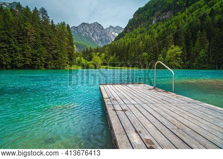 Alpine Summer Scenery With Picturesque Turquoise Mountain Lake. Plansarsko Lake And Green Pine Fores
