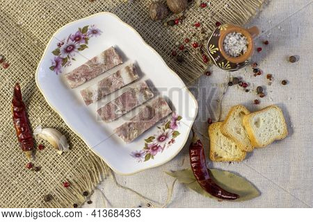 Homemade Brawn Headcheese Meat Product Saltison On Rough Linen Cloth With Sea Salt And Spices Top Vi