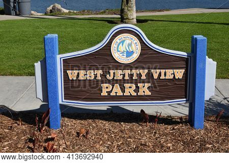NEWPORT BEACH, CALIFORNIA - 22 FEB 2017: West Jetty View Park sign on the Balboa Peninsula.