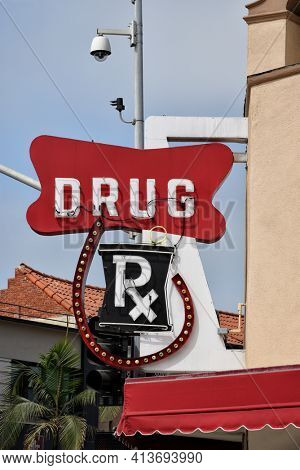 NEWPORT BEACH, CALIFORNIA - 24 AUG 2020: Drug RX sign on the Balboa Pharmacy Building int he popular beach town. 