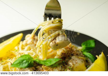 Carbonara, Spaghetti With A Cheese And Smoked Bacon Sauce Topped With Chicken Breast Pieces And Rega
