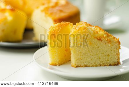 Portion Of Madeira Ring Loaf Cake Served On A Small Plate