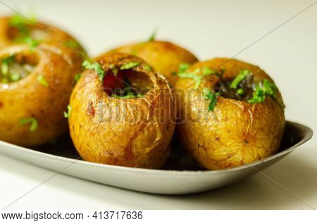 Mini Jacket Potatoes With A Fragrant Garlic Butter Infused With Italian Truffle Oil