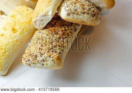 Various Types Of Bread Served On A Wicker Tray, Delicious And Fresh Rolls, Morning Food