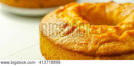 Freshly Made Madeira Ring Loaf Cake Decorated On White Background