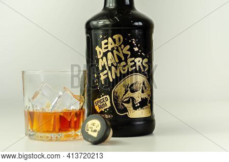 London, United Kingdom - August 04, 2020 A Glass With Spiced Rum Called Dead Man's Fingers And Ice C