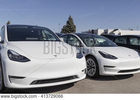 Indianapolis - Circa March 2021: Tesla Electric Vehicles Awaiting Preparation For Sale. Tesla Produc