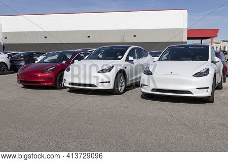 Indianapolis - Circa March 2021: Tesla Electric Vehicles Awaiting Preparation For Sale. Tesla Produc