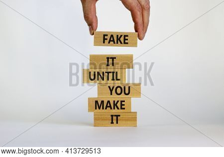 Fake It Until You Make It Symbol. Wooden Blocks With Words 'fake It Until You Make It'. Businessman 