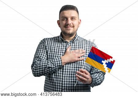 White Guy Holding A Flag Of Nagorno-karabakh Republic And Holds His Hand On His Heart Isolated On A 