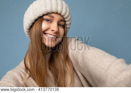 Closeup Shot Of Beautiful Sexy Positive Smiling Young Dark Blonde Woman Standing Isolated Over Colou