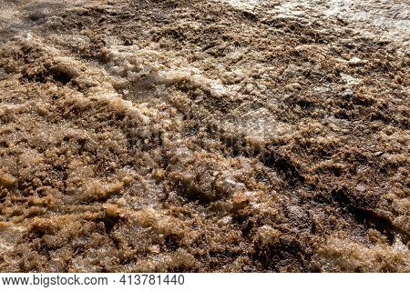 Dirty Snow With Sand And Salt. Deicing Winter Roads