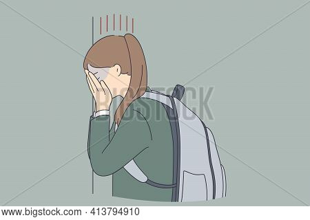 Depression, Child Bullying At School Concept. Sad Unhappy Depressed Young Schoolgirl Covering Her Fa