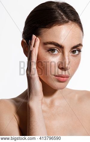 Beauty Woman With Freckles, Thick Eyebrows, Touching Face, Using Skin Care Lotion, Anti-aging Mask W