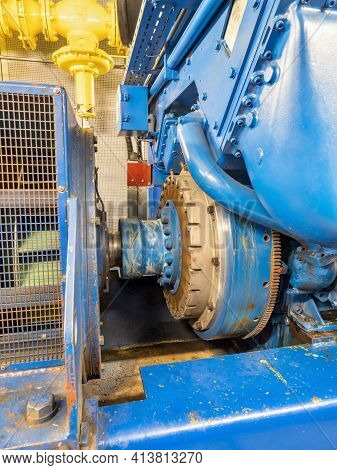 Starter Gear. Detail Of The Shaft Of An Engine Burning Natural Or Bio Gas And Rotating With An Alter
