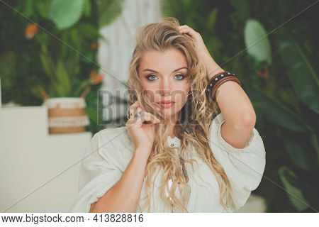 Young Pretty Blone Model Woman With Blonde Curly Hair Portrait