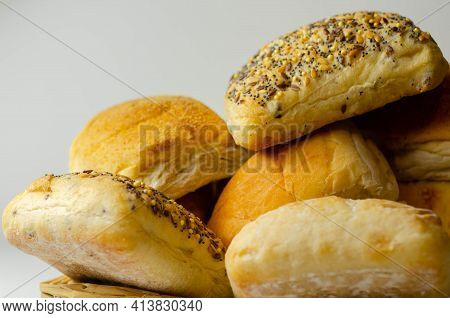 Various Types Of Bread Served On A Wicker Tray, Delicious And Fresh Rolls, Morning Food