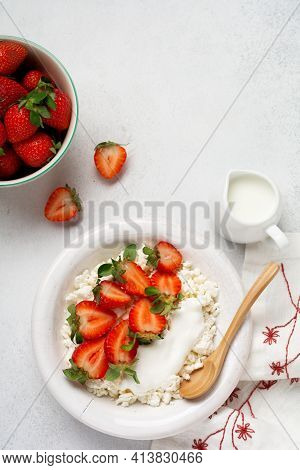 Cottage Cheese, Curd Cheese With Strawberries Berries In A Bowl, Ogranic Homemade Dairy Product. Hea