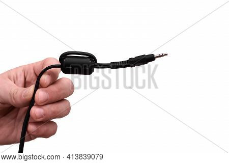 Close-up Jack Plug And A Cable. In The Hands Of A Man On The White Background.
