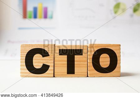 A Word Cto On Wooden Cubes. Business Concept. Business And Finance