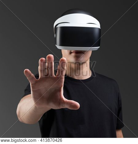 Man with virtual reality headsets on invisible screen social media post