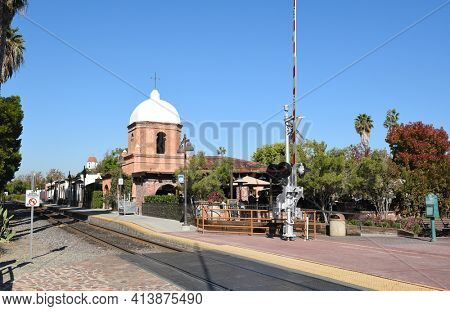 San Juan Capistrano, Ca - December 1, 2017: Restaurants and train tracks at the Verdugo Street Crossing at the Los Rios Historic District.