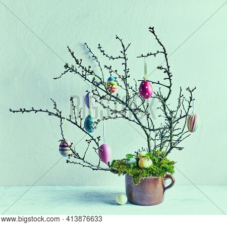 Easter tree with colorful Easter eggs. Natural Easter decoration