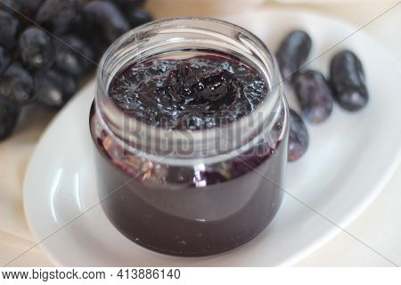 Home Made Grape Jam With Three Ingredients, Seedless Black Grapes, Sugar And Lime Juice.