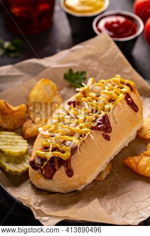 Chili Hot Dog With Onion And Mustard